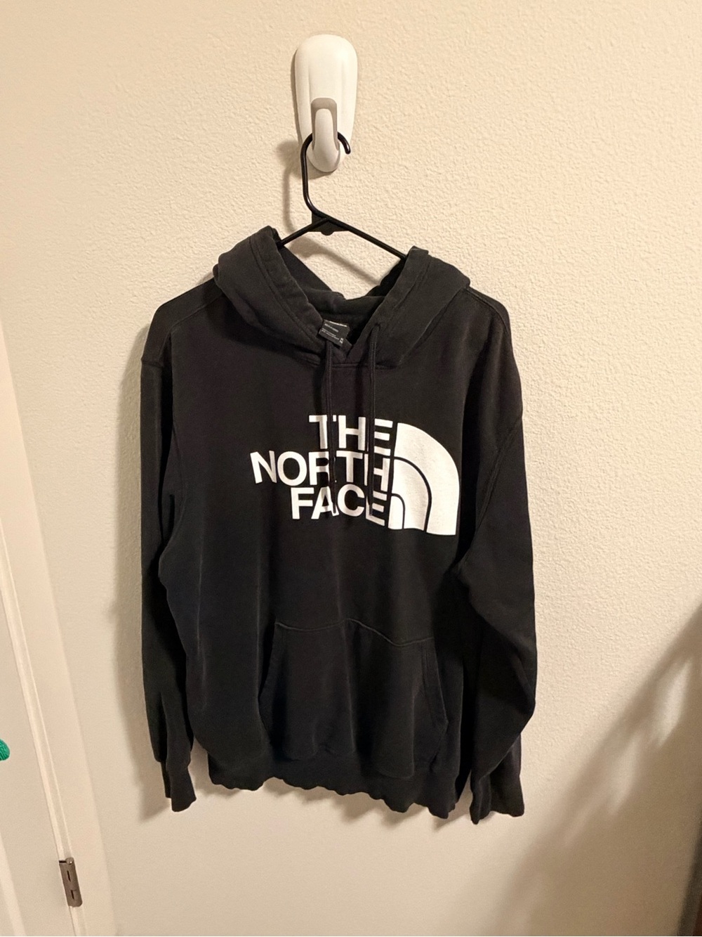 The north face men’s black hoodie with white logo size XL